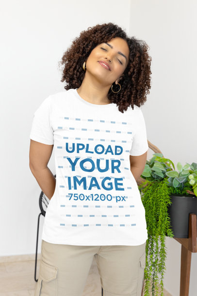 Mockup of a Curly-Haired Woman Wearing a Bella Canvas Crewneck T-Shirt