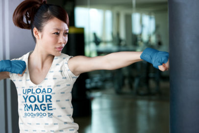 Sublimated V-Neck T-Shirt Mockup Featuring a Woman Training Box m31443 r-el2