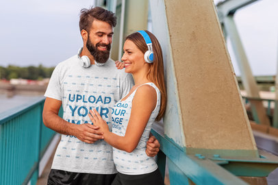 T-Shirt and Tank Top Mockup Featuring a Couple of Runners Posing on a Bridge