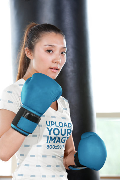 Sublimated V-Neck T-Shirt Mockup of a Serious Woman Practicing Box m31442 r-el2