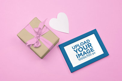 Valentine's Day Mockup of an Art Print Featuring a Gift and a Paper Heart m31737 r-el2