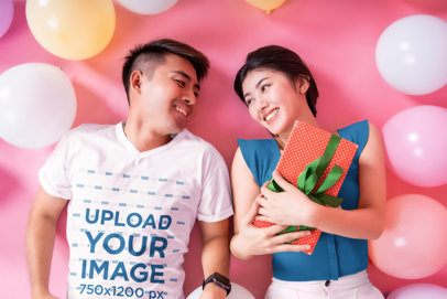 V-Neck Tee Mockup Featuring a Happy Couple Posing in a Valentine's-Decorated Setting m31629 r-el2
