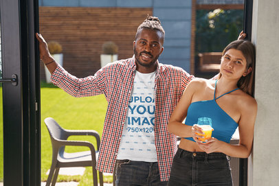 T-Shirt Mockup Featuring a Man Hanging Out With a Woman