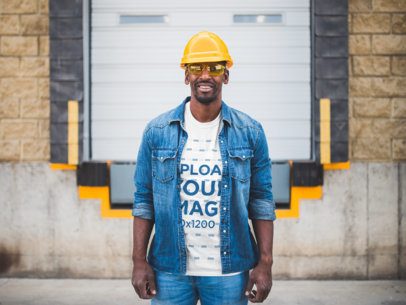 Smiling Man Wearing a T-Shirt Mockup and a Yellow Hard Hat