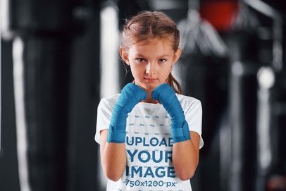 T-Shirt Mockup of a Girl Training Martial Arts
