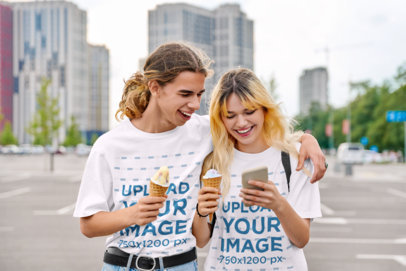 Heathered T-Shirt Mockup Featuring a Cheerful Couple With Ice Cream Cones