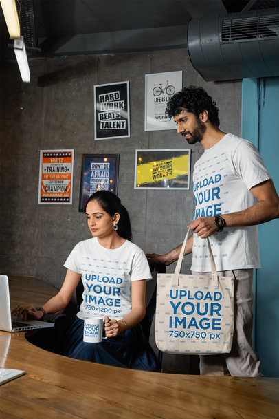 Gildan Tee Mockup of a  Woman Working With a Mug and a Man Carrying a Tote Bag