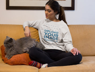 Beautiful Woman Wearing a Sweater Mockup with her Grumpy Cat