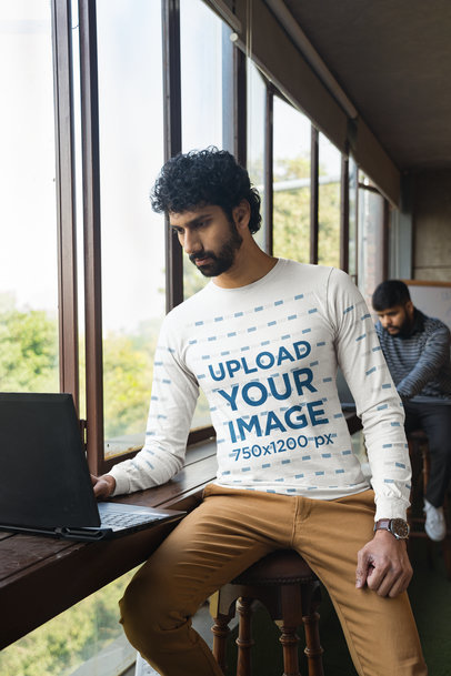 Bella Canvas Long-Sleeve Tee Mockup Featuring a Man Working