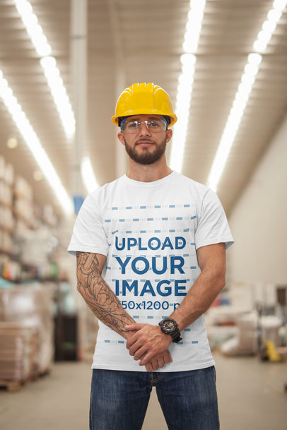 Man Wearing a T-Shirt Mockup and a Yellow Hard Hat a20383