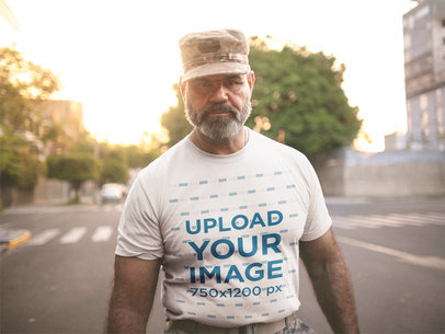 Mockup of a Veteran Soldier Wearing a T-Shirt on the Street