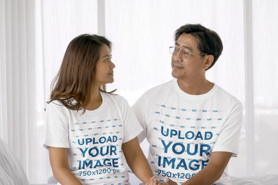 Round-Neck Tee Mockup Featuring a Couple Sitting on a Bed m16116 r-el2