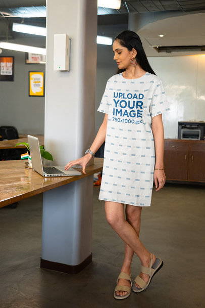 Sublimated T-Shirt Dress Mockup Featuring a Woman at Work 