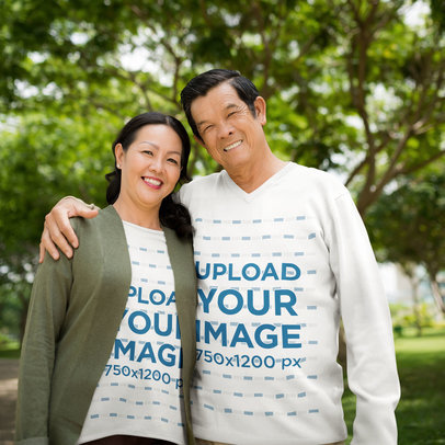 Sweatshirt and T-Shirt Mockup Featuring an Old Couple Smiling and Hugging m8459 r-el2