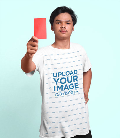 T-Shirt Mockup Featuring a Serious Man With a Red Soccer Card m31522 r-el2