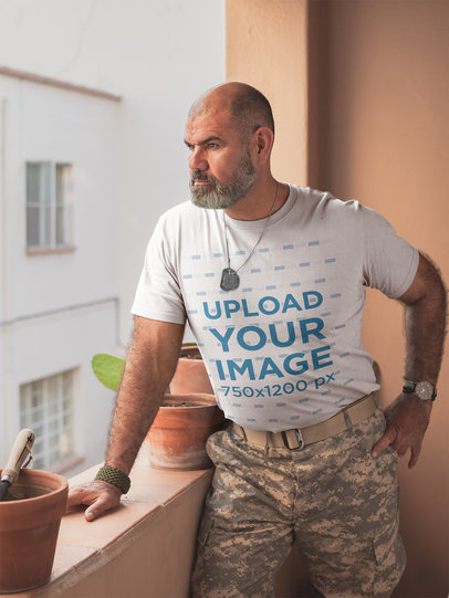 T-Shirt Mockup Featuring a Soldier in Army Gear