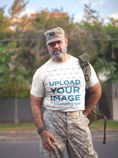 T-Shirt Mockup Featuring a Veteran Wearing Uniform on the Street