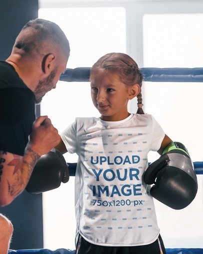 T-Shirt Mockup of a Girl Training With Big Boxing Gloves