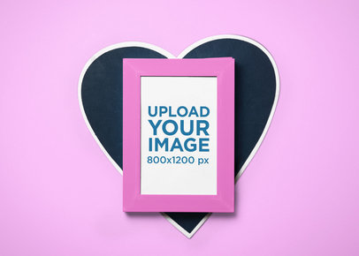 Mockup of an Art Print Placed over a Heart-Shaped Cardboard m31823 r-el2