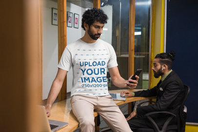 Crewneck Gildan Tee Mockup Featuring a Woman Working in an Office