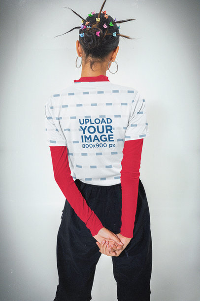 Jersey Mockup Featuring a Woman with a Y2K-Inspired Spiky Hairstyle