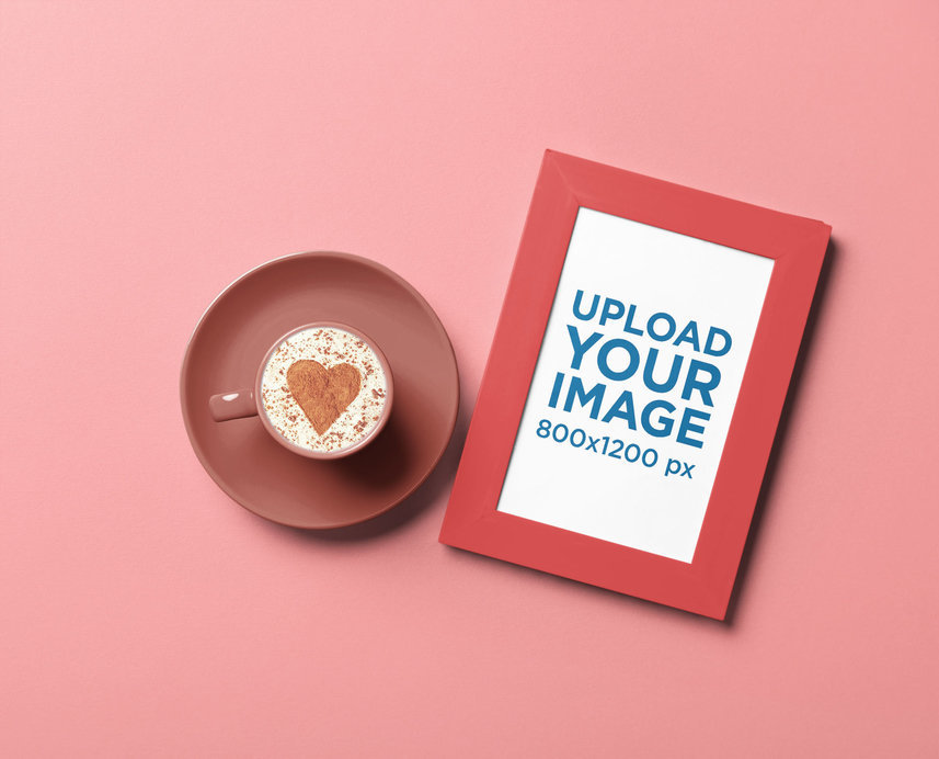 Mockup of an Art Print Placed Next to a Cup of Coffee With a Heart