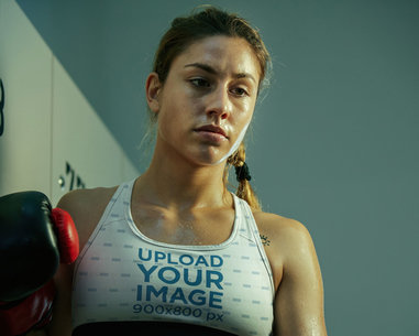 Sports Bra Mockup of a Serious Athletic Woman Posing After Boxing Training m31543 r-el2