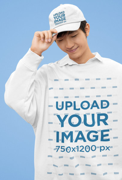 Kawaii-Themed Mockup Featuring a Man Wearing a Dad Hat and an Oversized Sweatshirt m30716