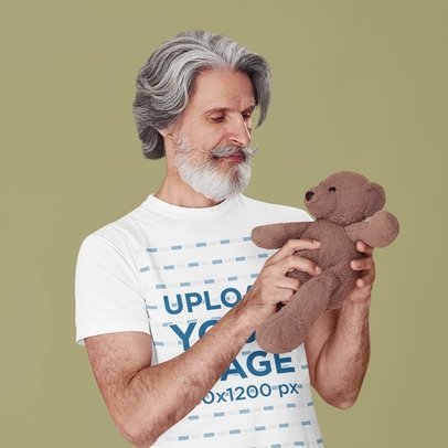 T-Shirt Mockup Featuring a Senior Man Holding a Teddy Bear