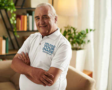 Polo Shirt Mockup Featuring a Senior Man Crossing His Arms m31842 r-el2
