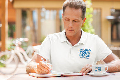 Espresso Cup Mockup of a Senior Man in a Polo Shirt Writing in a Notebook m10791 r-el2