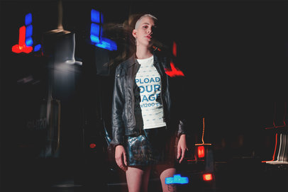 Slow Shutter Shot of a Woman Wearing a Round Neck Tee Mockup and a Black Jacket at Night