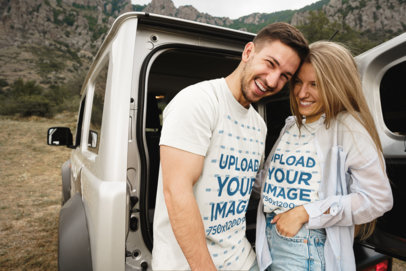 T-Shirt Mockup Featuring a Happy Couple Poising Outside a Car Trunk m17443 r-el2