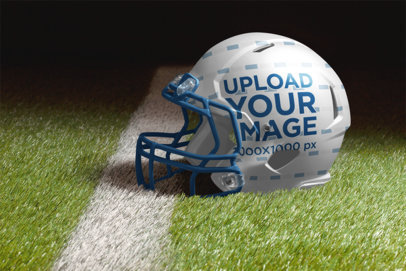 Football Helmet Mockup Featuring a Grass Field
