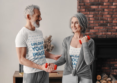 T-Shirt and Tank Top Mockup of a Happy Elderly Couple Training at Home