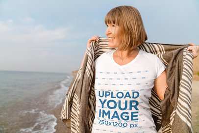 V-Neck T-Shirt Mockup Featuring a Senior Woman Watching a Sunset on the Beach m28375 r-el2