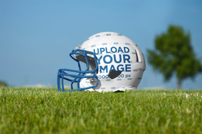 Mockup of a Football Helmet Lying on the Grass Field m31808 r-el2