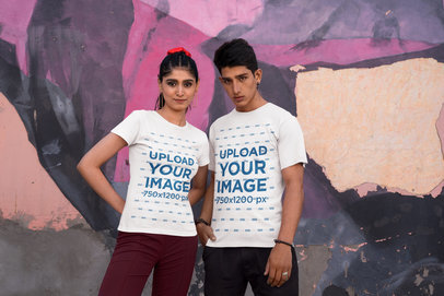 Mockup of a Young Couple Wearing Rounded-Neck Gildan T-Shirts