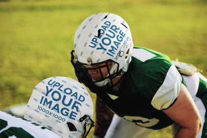 Mockup of Two Helmets Featuring Football Players on the Field m31832 r-el2