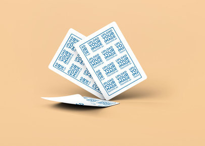 Mockup of Three Playing Cards Placed on a Customizable Surface