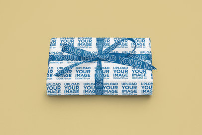 Gift-Themed Mockup Featuring a Wrapping Paper and a Ribbon