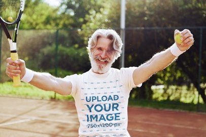 T-Shirt Mockup of a Cheerful Senior Man Playing a Tennis Game