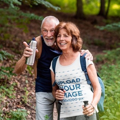 Round-Neck Tee Mockup of an Elderly Couple on a Hike