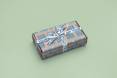 Mockup of a Box With a Ribbon Placed on a Colorful Surface