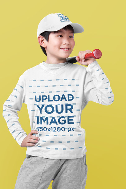 T-Shirt and Hat Mockup Featuring a Little Kid Holding a Baseball Bat m32104 r-el2