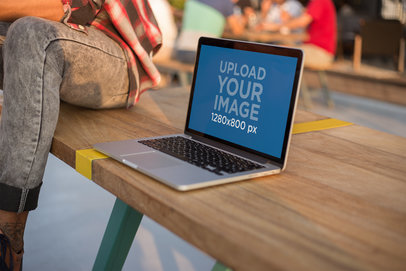 MacBook Mockup Standing on a Wooden Bench