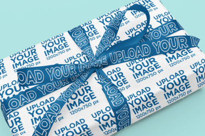 Ribbon Mockup Featuring a Gift With Wrapping Paper