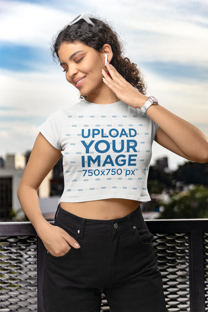 Gildan Crop Top Mockup of a Smiling Woman Posing in a Balcony m32069