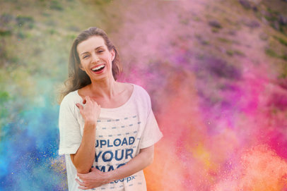 Heathered T-Shirt Mockup Featuring a Cheerful Woman Celebrating Holi