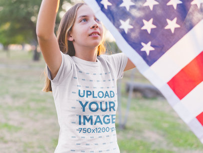 Girl Hanging the American Flag Wearing a T-Shirt Mockup